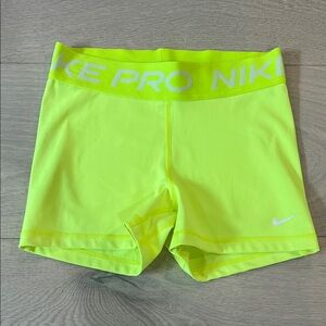 Neon yellow Nike spandex shorts